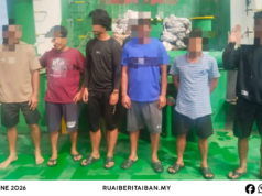 Sebuah bot tunda ditan pengudah ditemu enda ngibarka tambai Malaysia