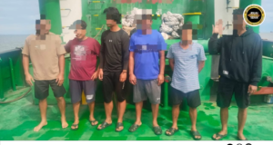 Sebuah bot tunda ditan pengudah ditemu enda ngibarka tambai Malaysia