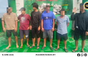 Sebuah bot tunda ditan pengudah ditemu enda ngibarka tambai Malaysia